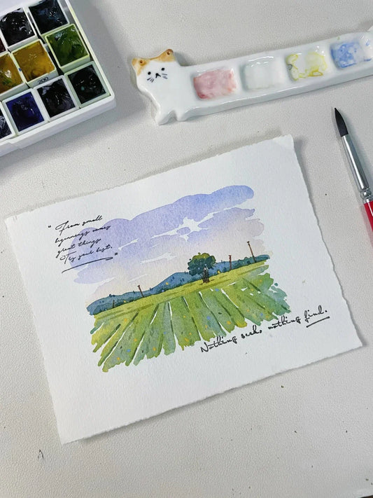 Watercolor tutorial image featuring a peaceful green field with distant mountains, purple sky gradients, and handwritten inspirational quotes